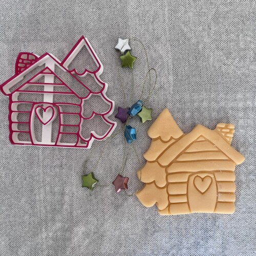 Christmas cottage with pine tree 2024