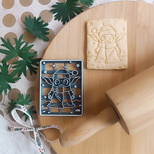 Baby Yoda in a Santa hat 2025